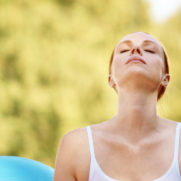 Young woman deep in her yoga meditation - Copyspace